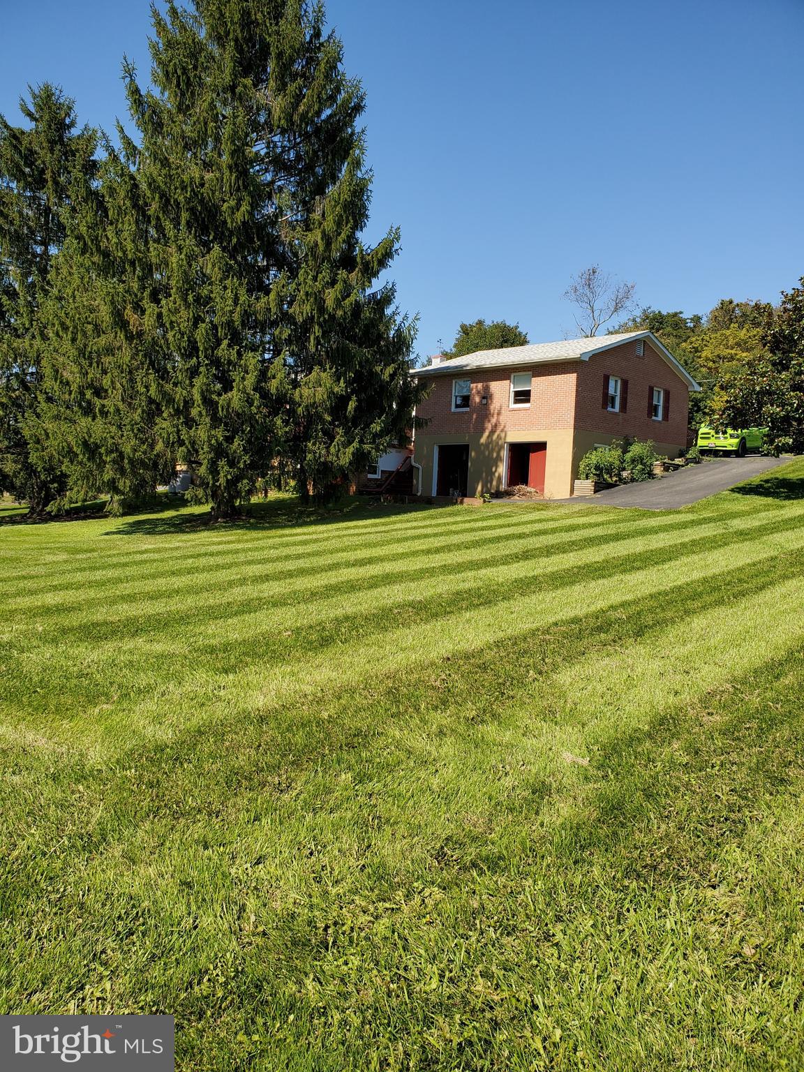 1035 Round Hill Road Winchester, VA 22602 - Photo 28 of 35 backyard and shows backside of house