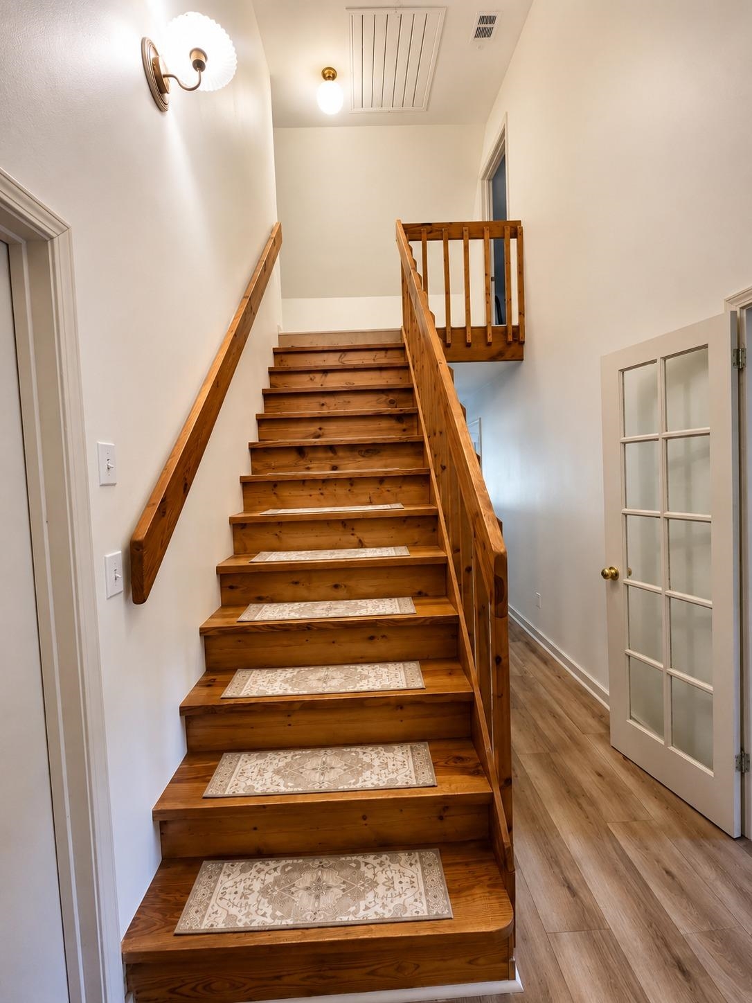 470 Rich Road Somerville, TN 38068 - Photo 32 of 40 Warm wood staircase with matching wood handrails and balusters
