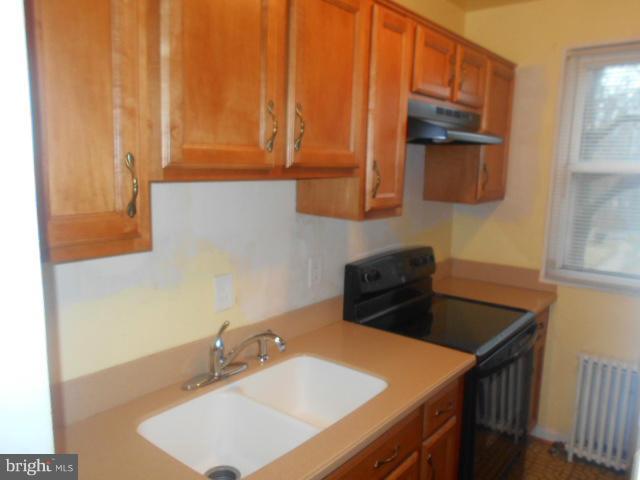 510 Ridge Road Southeast, Unit 204 Washington, DC 20019 - Photo 7 of 15 Kitchen