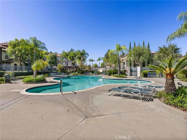 a view of a park with large trees