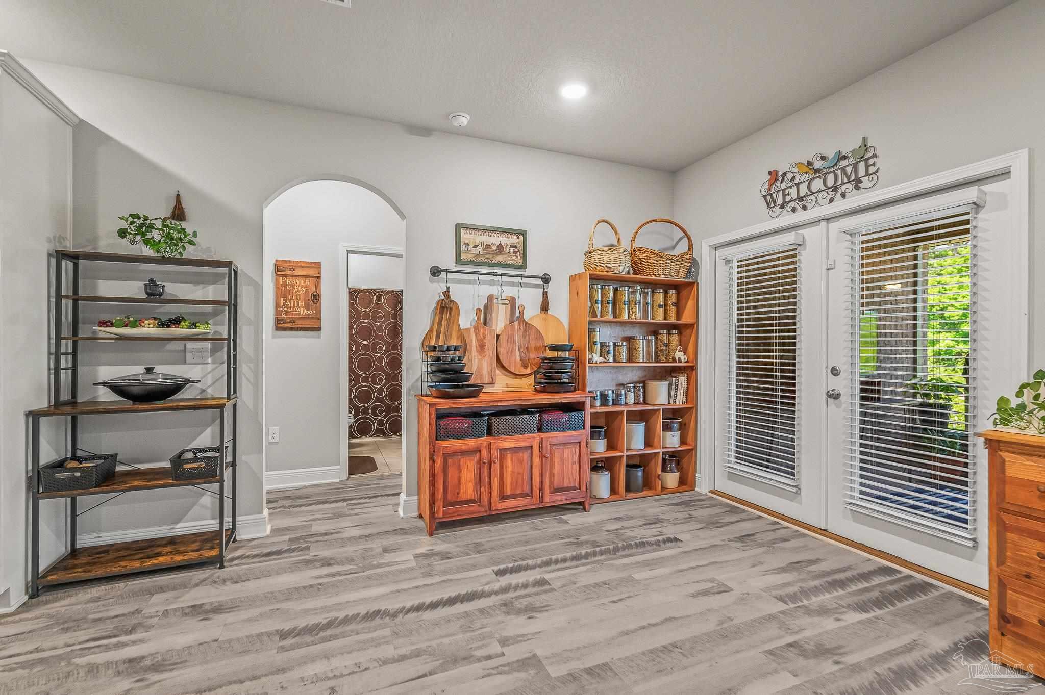 8056 Stream Ridge Road Pensacola, FL 32526 - Photo 48 of 71 a view of a bedroom with furniture and window