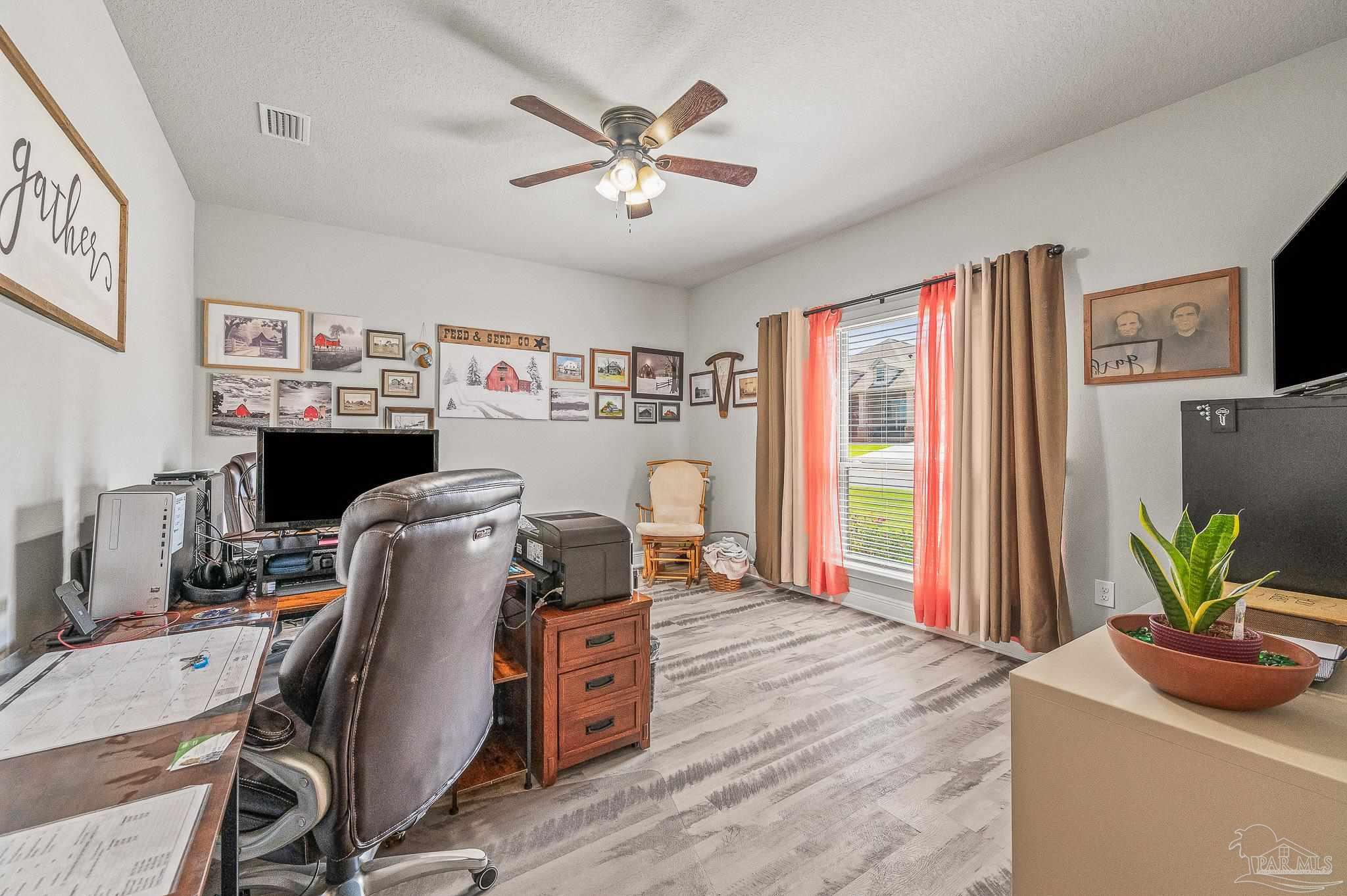8056 Stream Ridge Road Pensacola, FL 32526 - Photo 60 of 71 a work room with furniture and a window
