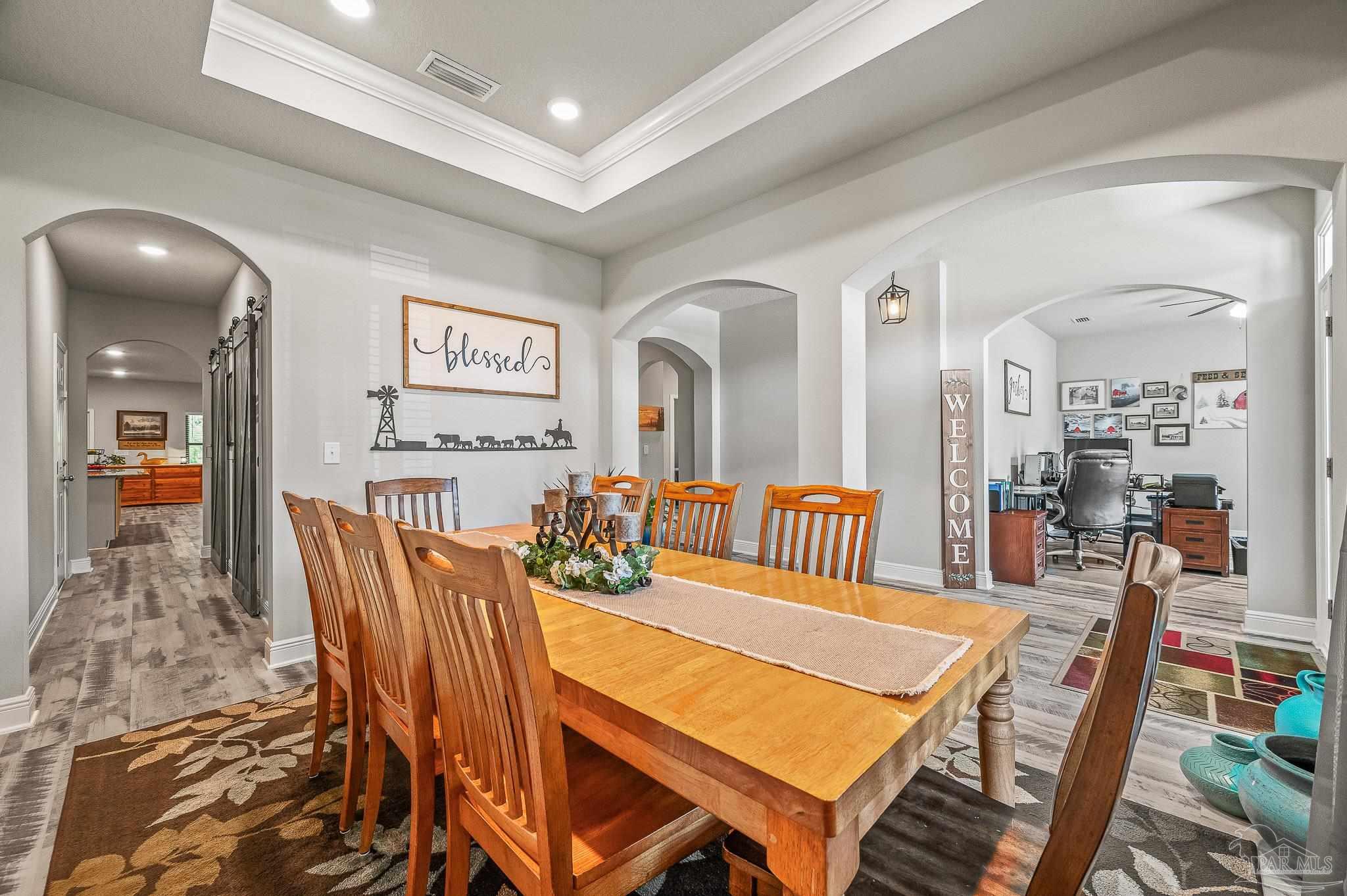 8056 Stream Ridge Road Pensacola, FL 32526 - Photo 8 of 71 a view of a dining room with furniture