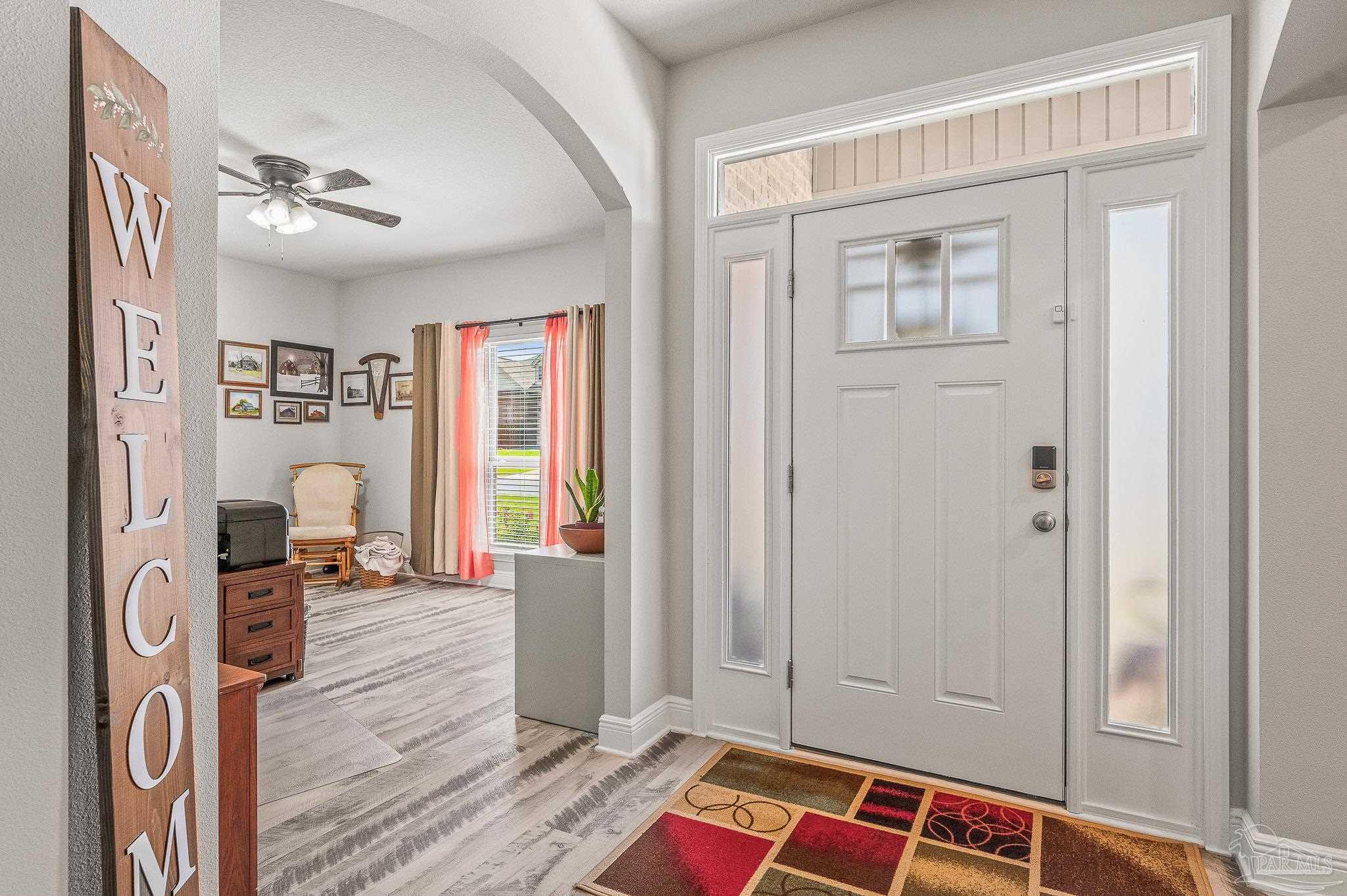 8056 Stream Ridge Road Pensacola, FL 32526 - Photo 10 of 71 a bed room with a bed and a window