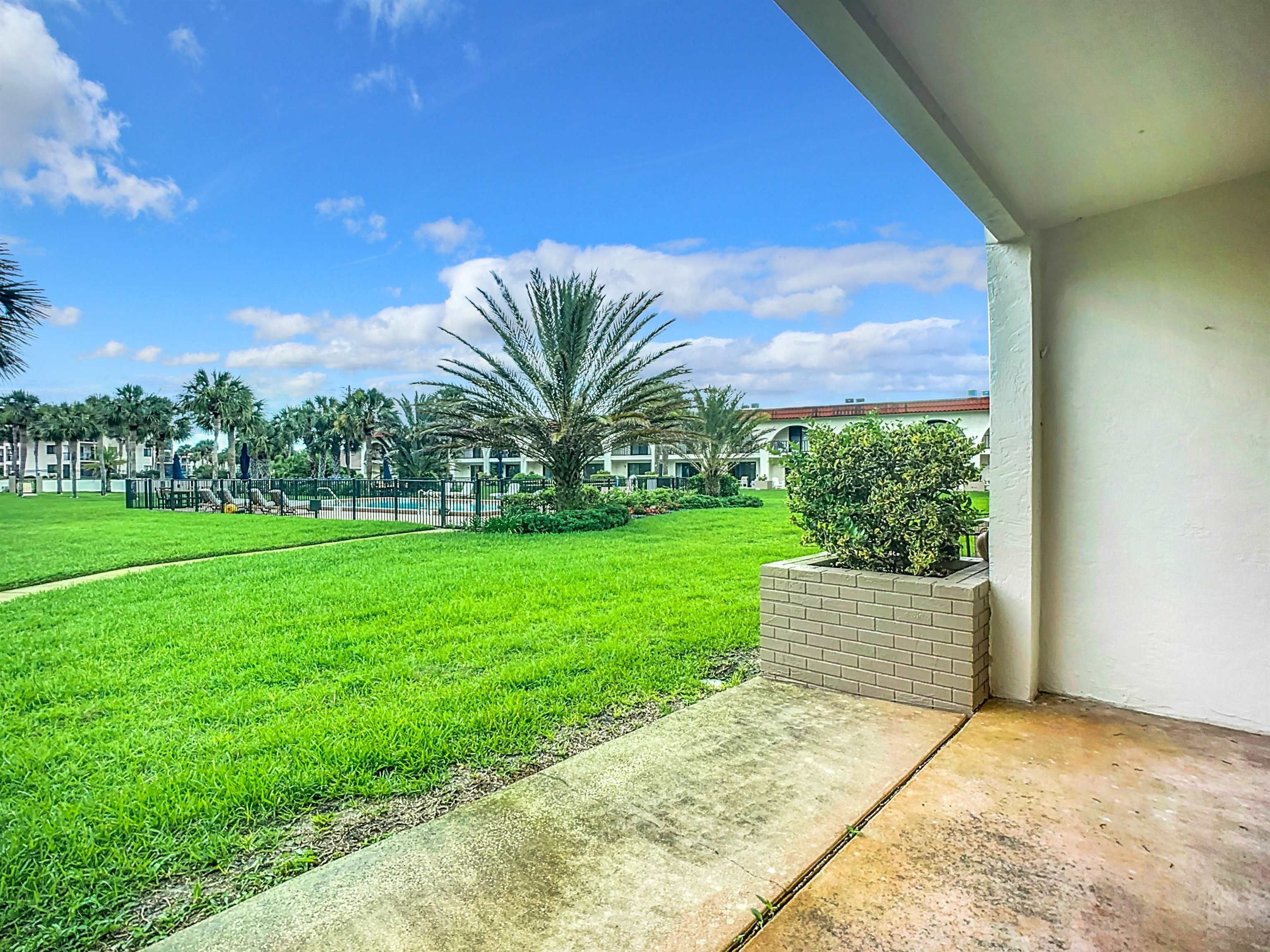 21 Dondanville Road, Unit 20 St. Augustine, FL 32080 - Photo 30 of 33 a view of a house with a garden