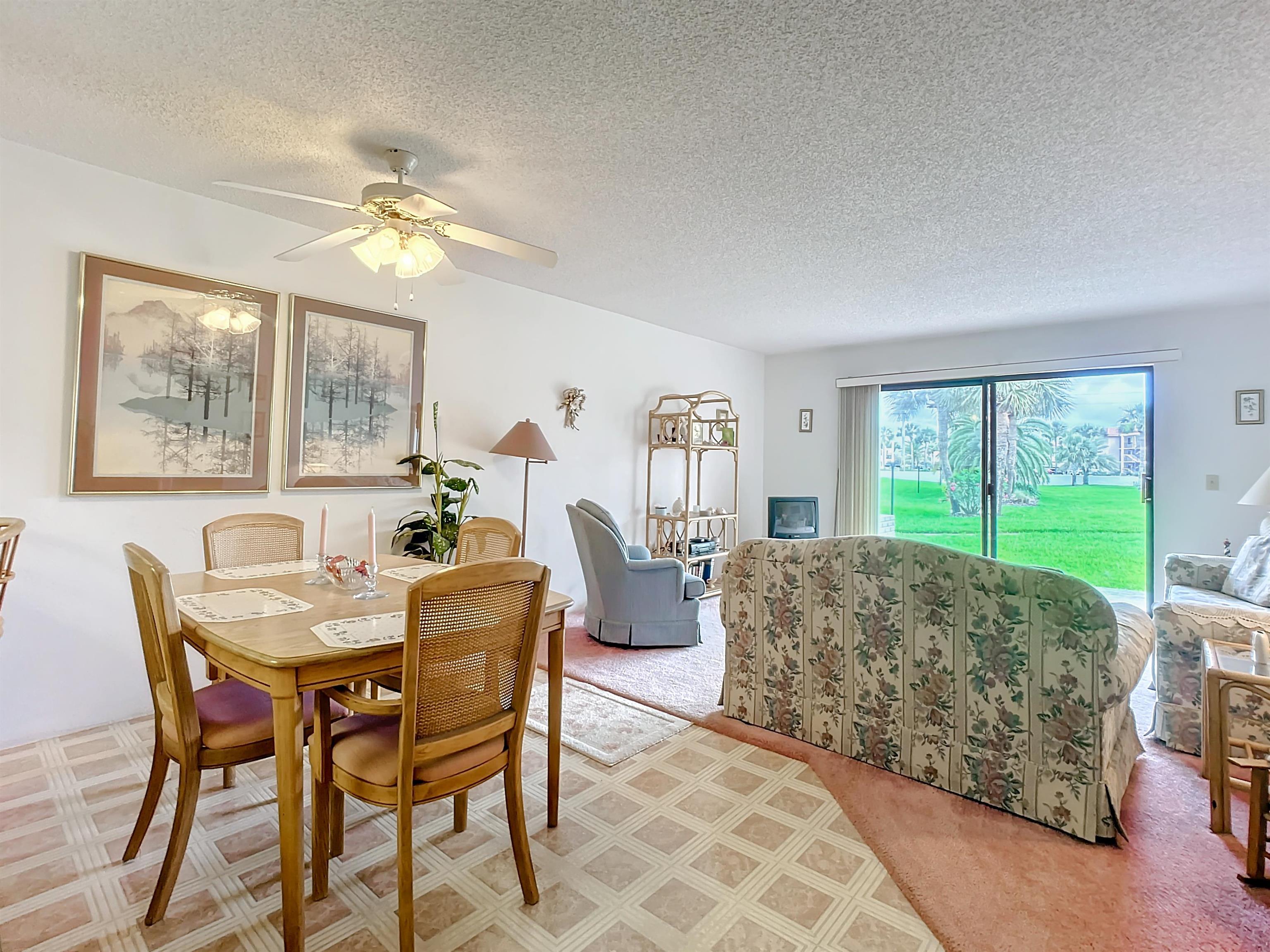 21 Dondanville Road, Unit 20 St. Augustine, FL 32080 - Photo 10 of 33 a view of a livingroom with furniture and a large window