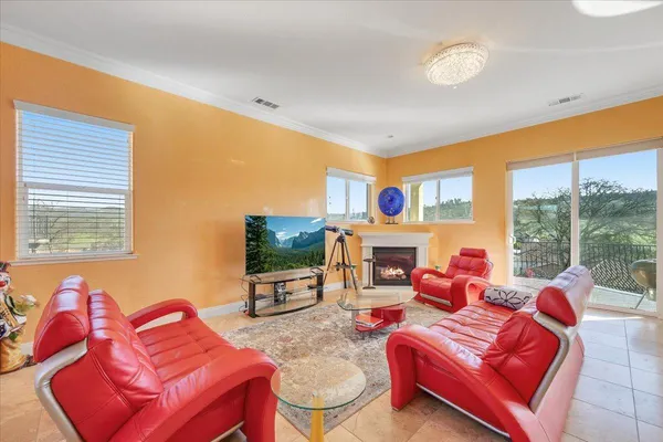 a view of a balcony with furniture