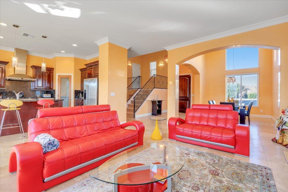 78 Aphrodite Court Copperopolis, CA 95228 - Photo 18 of 98 a living room with furniture and a floor to ceiling window