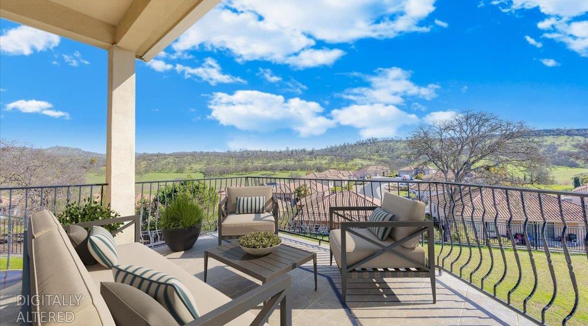 78 Aphrodite Court Copperopolis, CA 95228 - Photo 20 of 98 a view of a balcony with lake view and wooden floor