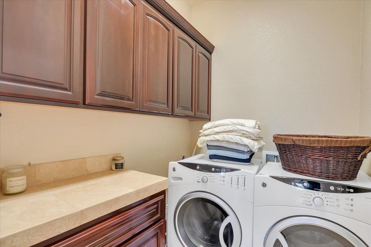 78 Aphrodite Court Copperopolis, CA 95228 - Photo 34 of 98 Large laundry room with storage and folding area.