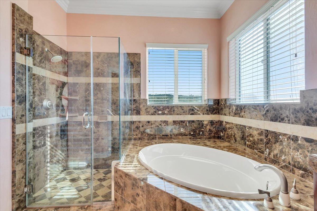 78 Aphrodite Court Copperopolis, CA 95228 - Photo 39 of 98 a bathroom with a bathtub and shower