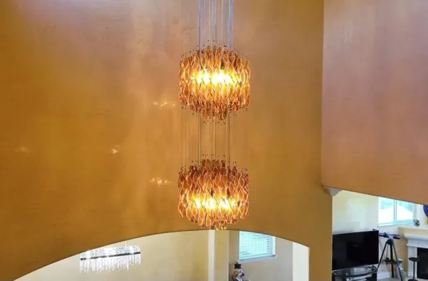 an aerial view of residential houses with outdoor space and swimming pool