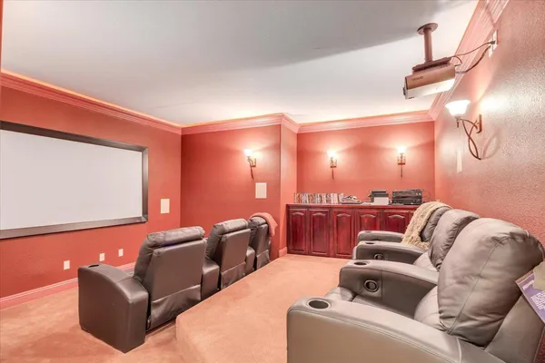 a room with gym equipment and windows
