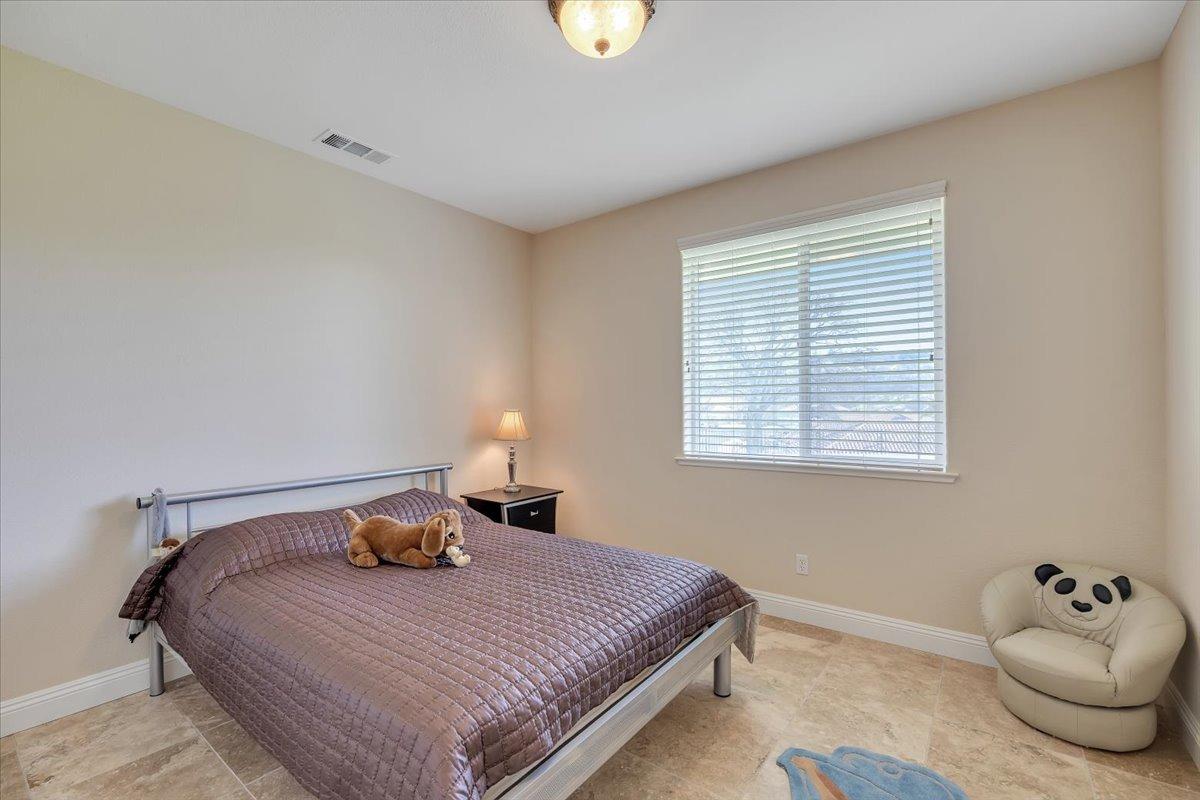 78 Aphrodite Court Copperopolis, CA 95228 - Photo 57 of 98 a bedroom with a bed and window