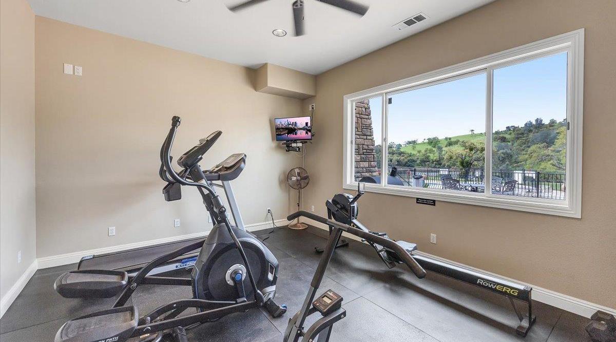 78 Aphrodite Court Copperopolis, CA 95228 - Photo 89 of 98 a room with gym equipment and windows