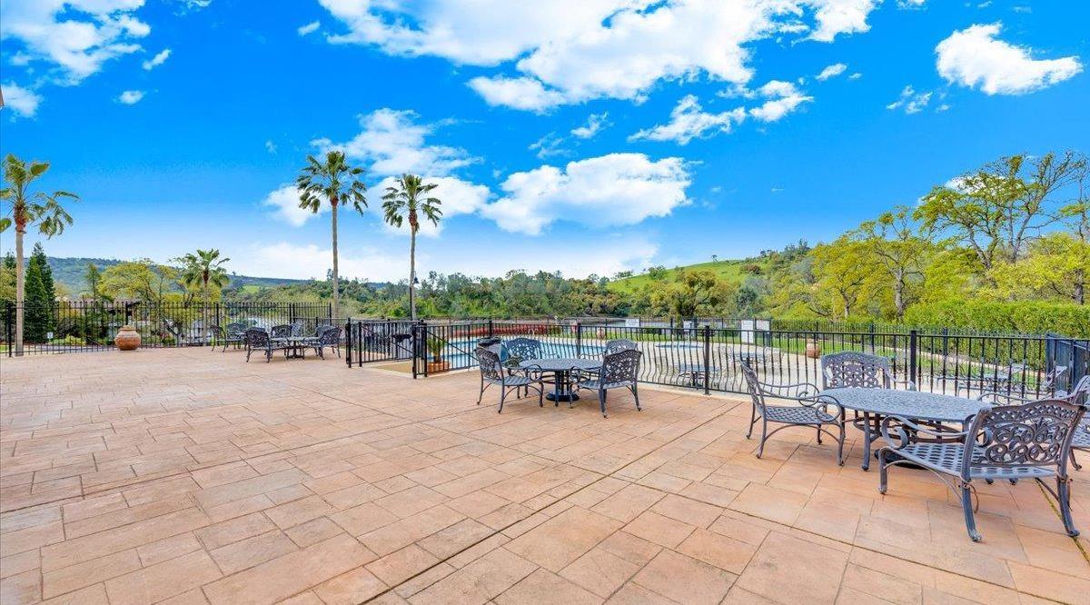 78 Aphrodite Court Copperopolis, CA 95228 - Photo 90 of 98 a view of a patio with a table and chairs