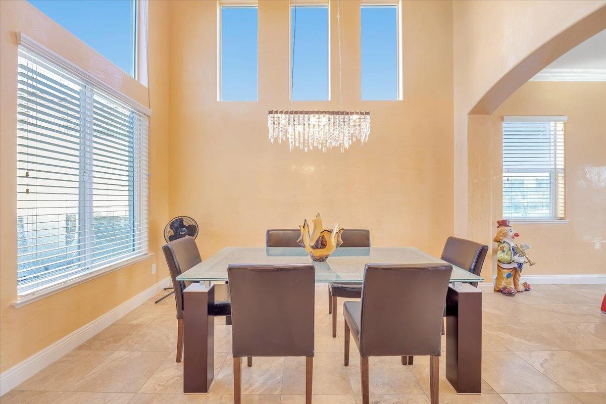 78 Aphrodite Court Copperopolis, CA 95228 - Photo 10 of 98 a view of a dining room with furniture and a window