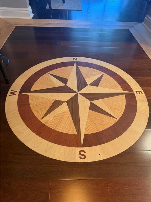 50 Central Avenue, Unit 14B Sarasota, FL 34236 - Photo 14 of 69 a view of an empty room with wooden floor