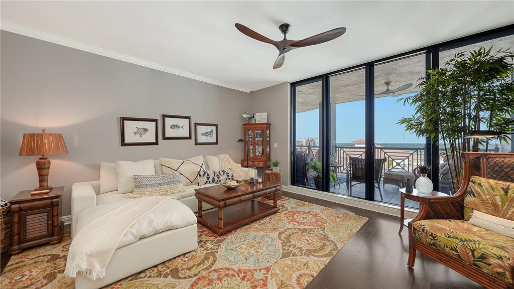 50 Central Avenue, Unit 14B Sarasota, FL 34236 - Photo 18 of 69 a living room with furniture and a large window