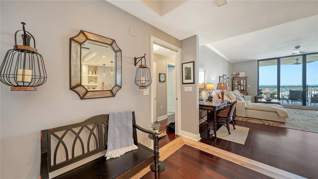 50 Central Avenue, Unit 14B Sarasota, FL 34236 - Photo 21 of 69 a view of a livingroom with furniture and a floor to ceiling window