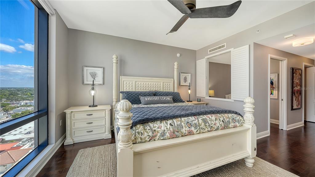 50 Central Avenue, Unit 14B Sarasota, FL 34236 - Photo 23 of 69 a bed room with a bed and a television