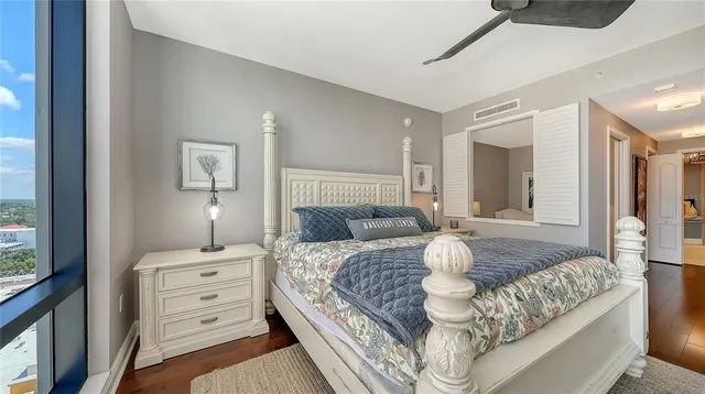 a bathroom with a granite countertop bathtub shower and a sink