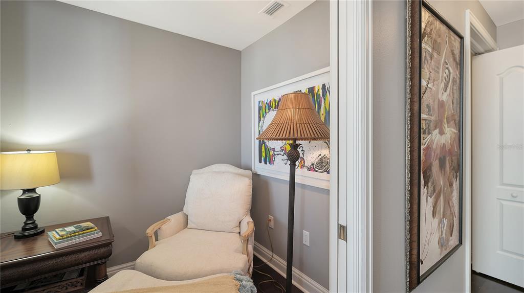 50 Central Avenue, Unit 14B Sarasota, FL 34236 - Photo 25 of 69 a bathroom with a toilet sink vanity tub and mirror