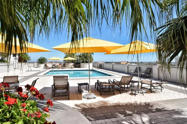 a view of a living room and kitchen