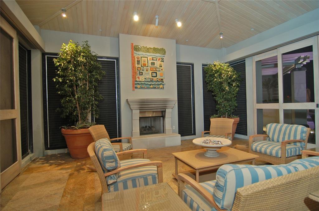 50 Central Avenue, Unit 14B Sarasota, FL 34236 - Photo 60 of 69 a living room with furniture and a potted plant