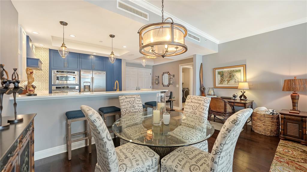 50 Central Avenue, Unit 14B Sarasota, FL 34236 - Photo 9 of 69 a view of a dining room with furniture