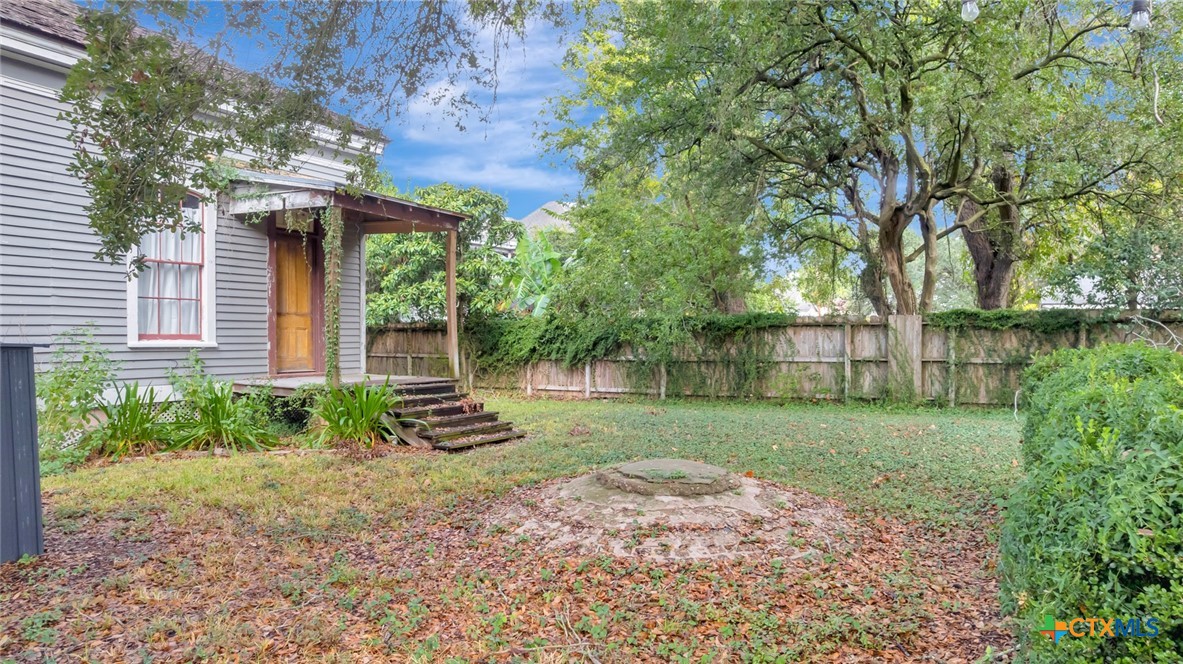 502 North Liberty Street Victoria, TX 77901 - Photo 15 of 17 a front view of a house with a yard