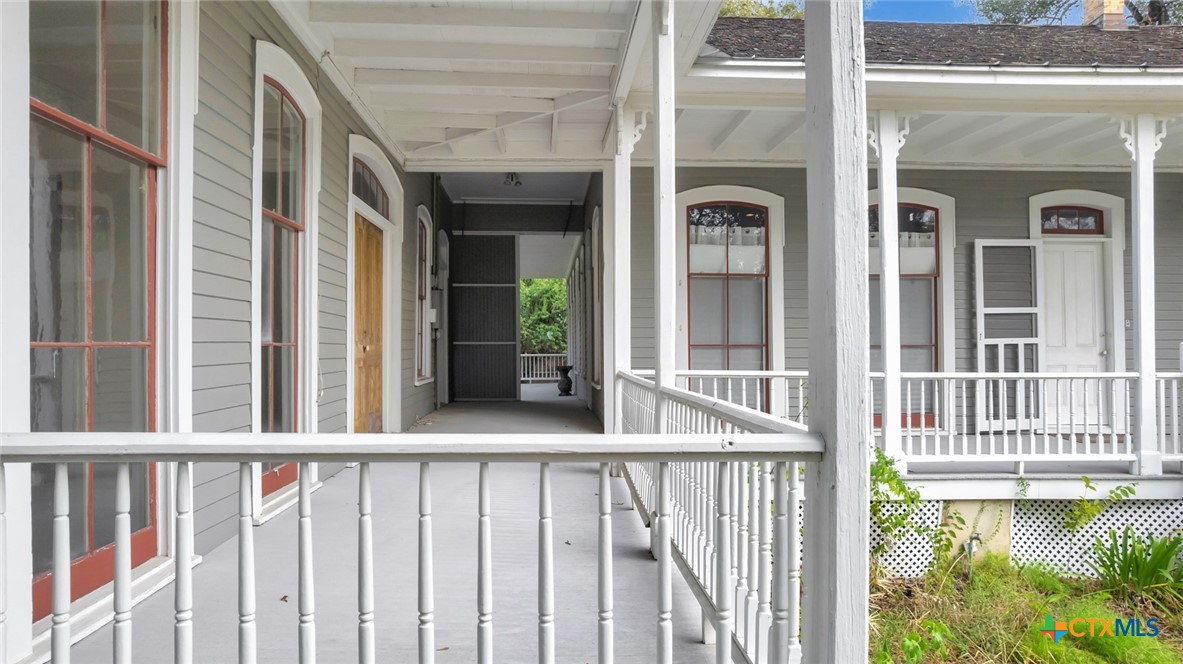 502 North Liberty Street Victoria, TX 77901 - Photo 7 of 17 a view of a porch with a floor to ceiling window