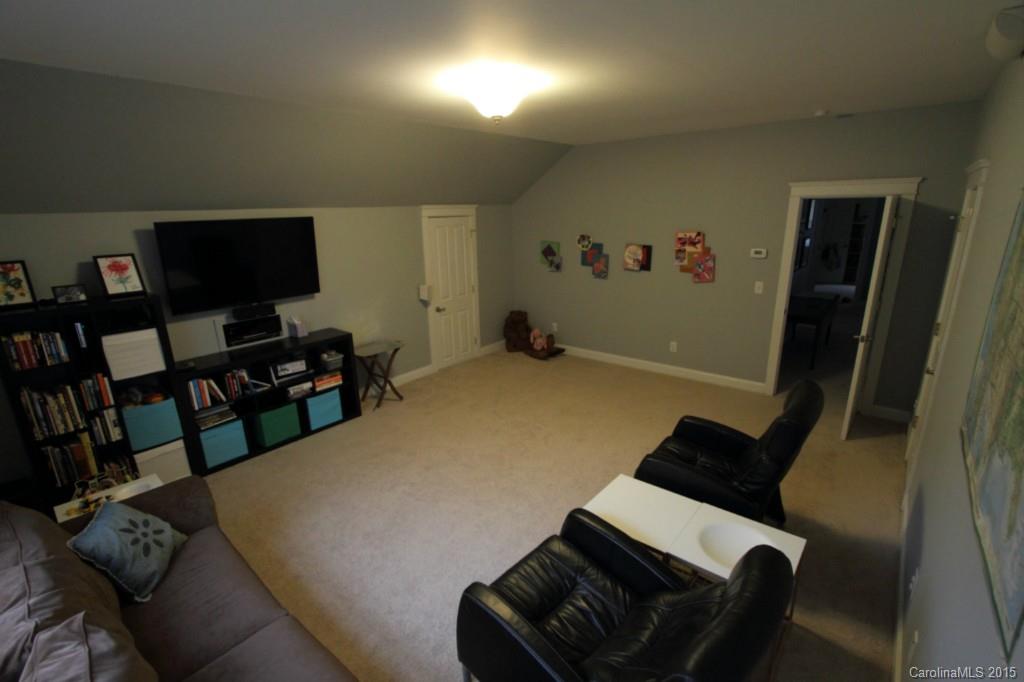112 View Lake Street Davidson, NC 28036 - Photo 13 of 24 a bedroom with a bed and a television