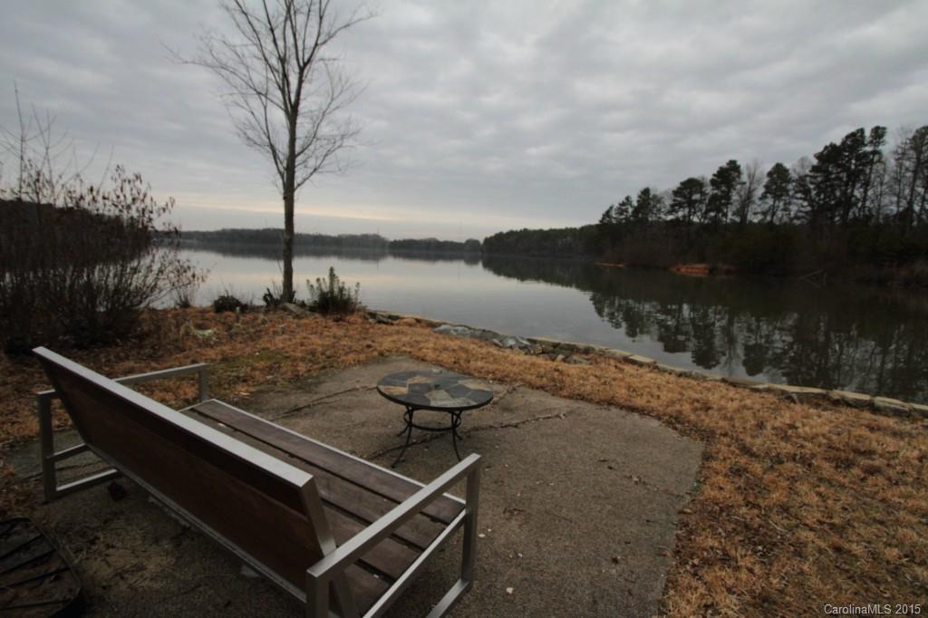 112 View Lake Street Davidson, NC 28036 - Photo 15 of 24 a view of a lake with a mountain in the background