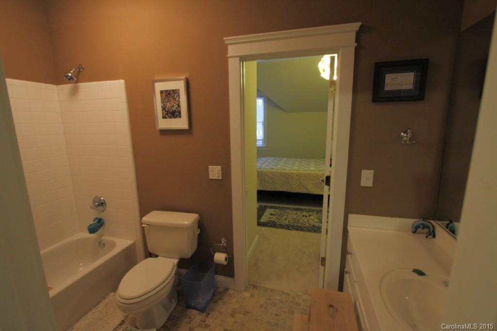 112 View Lake Street Davidson, NC 28036 - Photo 21 of 24 a bathroom with a toilet sink and shower