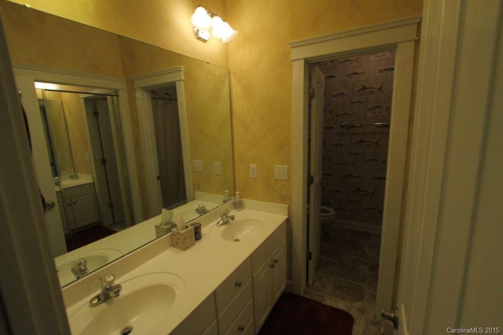 112 View Lake Street Davidson, NC 28036 - Photo 24 of 24 a bathroom with a sink and a mirror