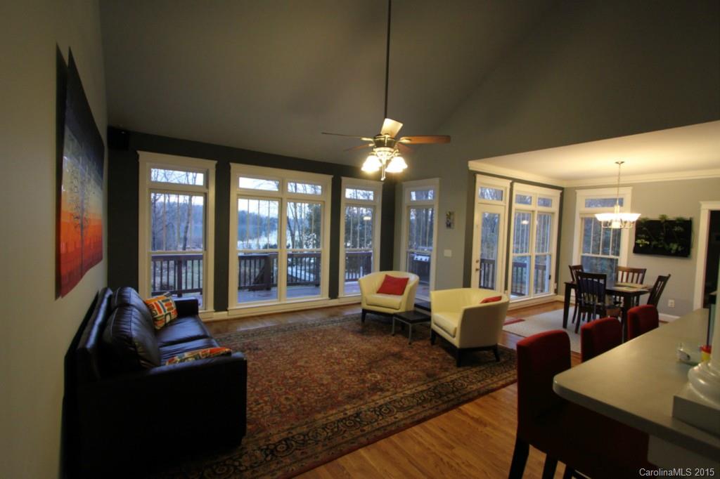 112 View Lake Street Davidson, NC 28036 - Photo 4 of 24 a living room with furniture and large windows