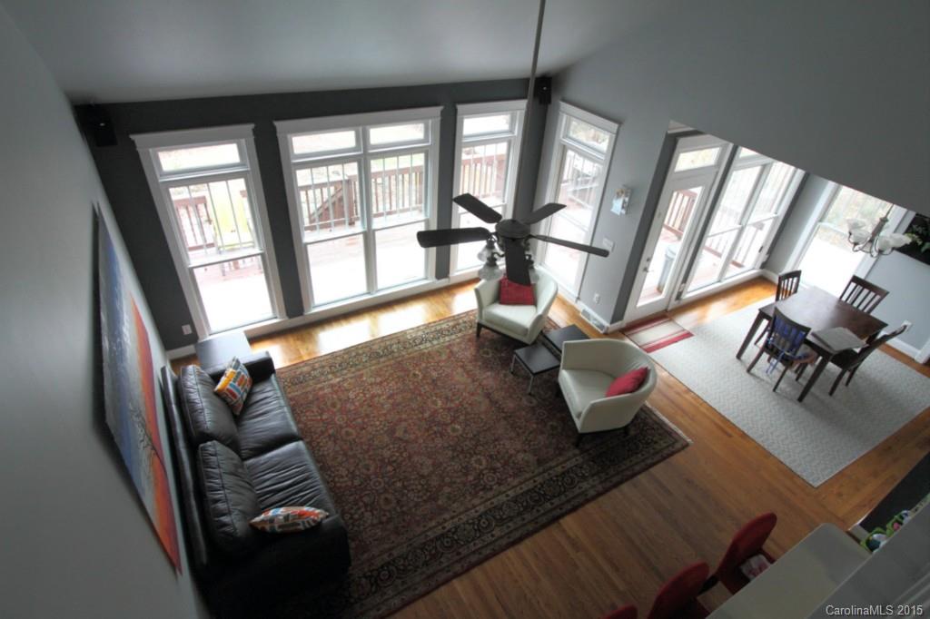 112 View Lake Street Davidson, NC 28036 - Photo 6 of 24 a living room with furniture and a floor to ceiling window
