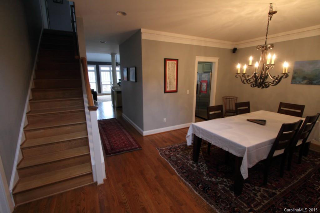112 View Lake Street Davidson, NC 28036 - Photo 10 of 24 a view of a dining room with furniture and wooden floor