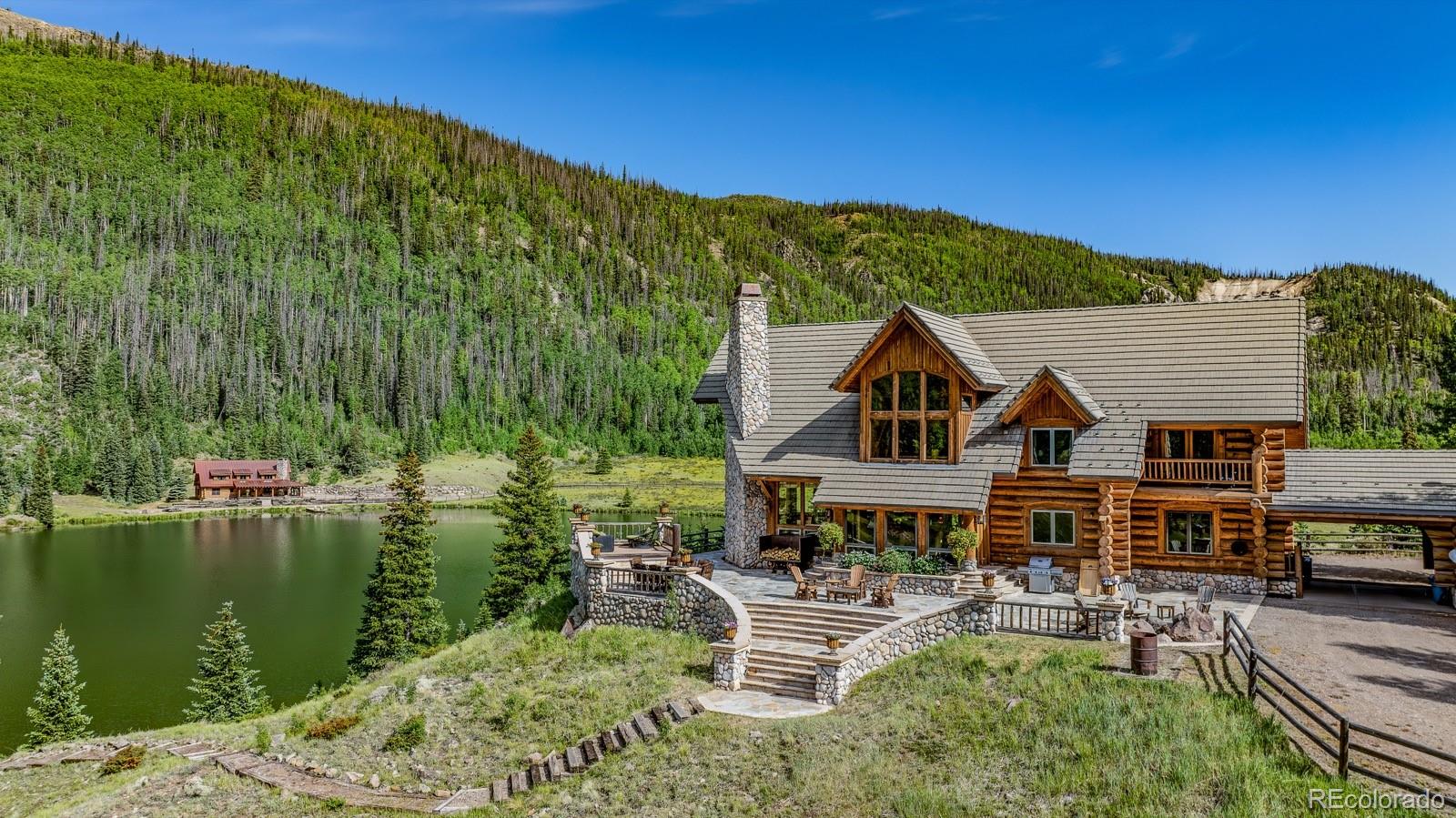 2418 Forest Road Creede, CO 81130 - Photo 18 of 50 a front view of a house with a garden