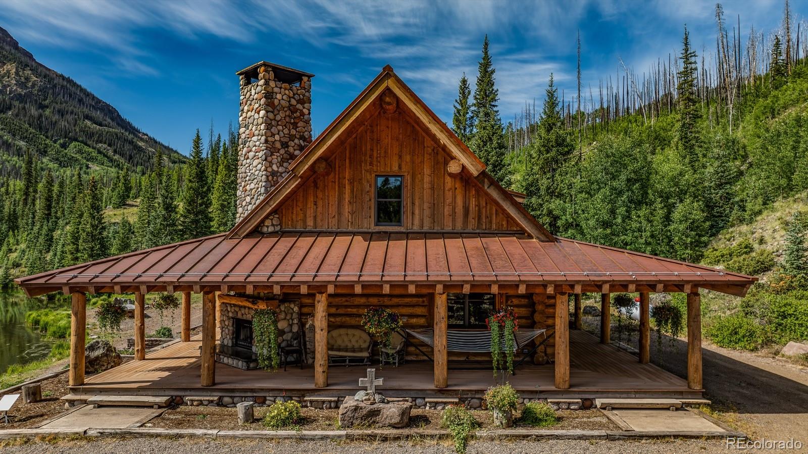 2418 Forest Road Creede, CO 81130 - Photo 26 of 50 a view of a house with garden