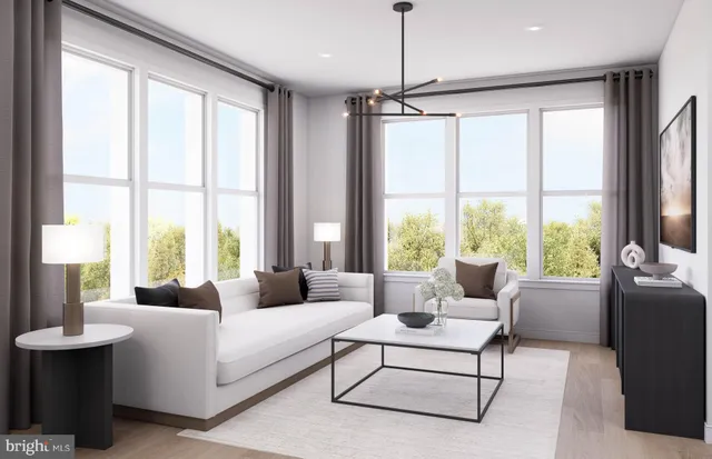 a kitchen with stainless steel appliances kitchen island granite countertop a stove a sink and a refrigerator