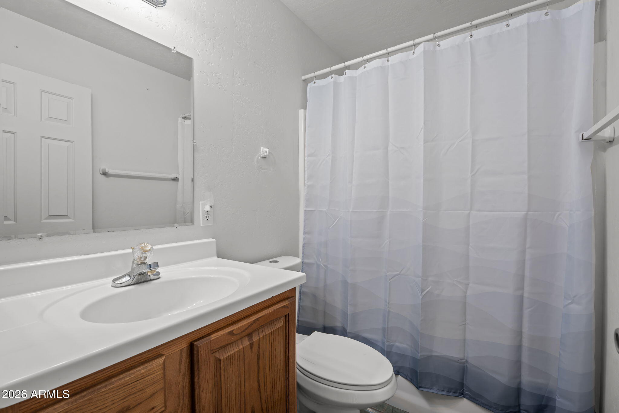 27144 Bennett Way Congress, AZ 85332 - Photo 9 of 33 a bathroom with a sink a toilet and shower