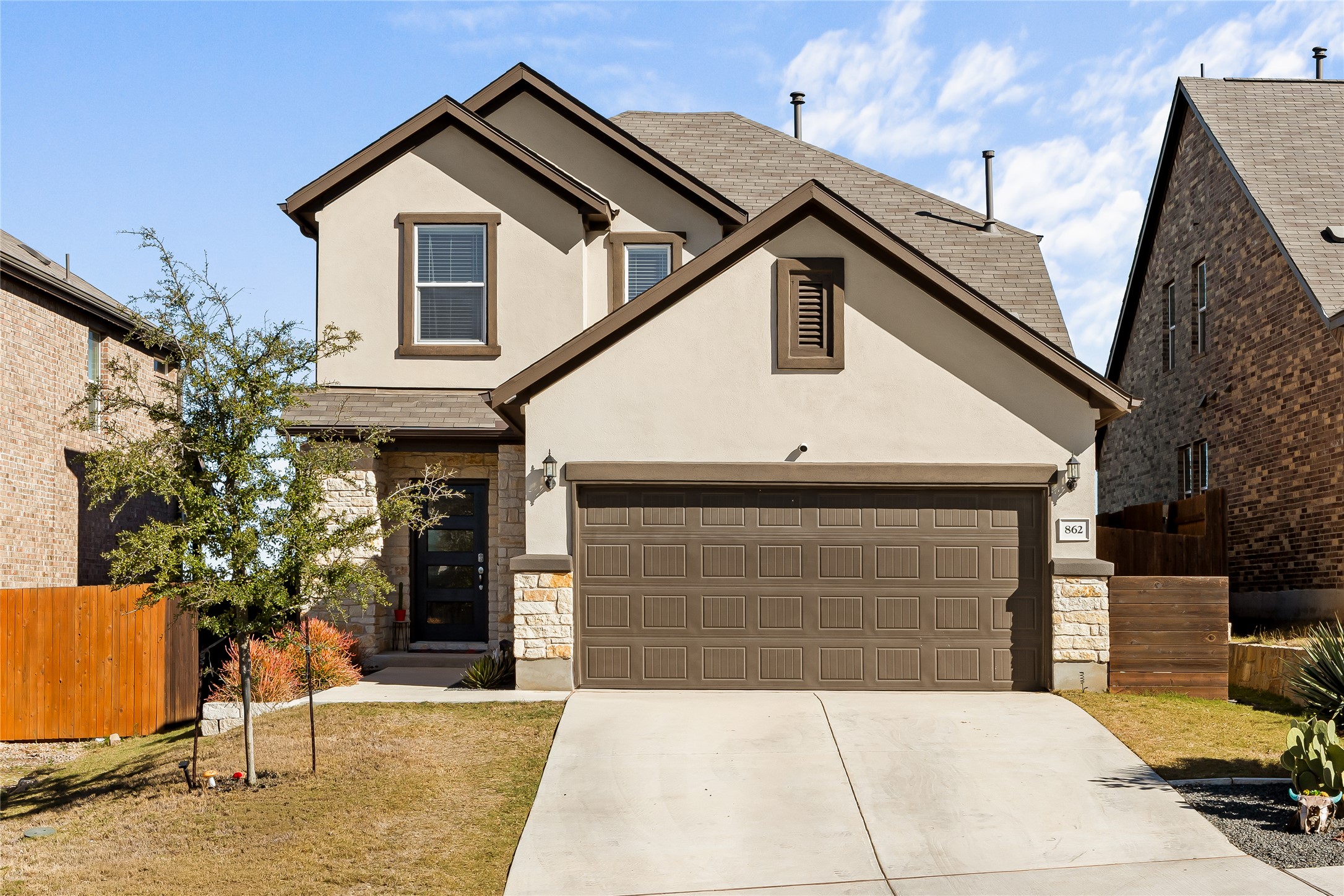 862 Pepperbark Loop Buda, TX 78610 - Photo 1 of 40 a house view with a outdoor space
