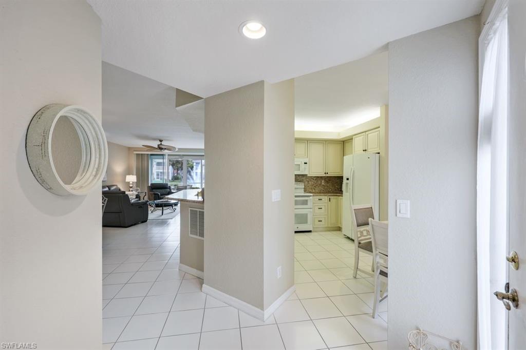 23730 Eddystone Road, Unit 5102 Bonita Springs, FL 34135 - Photo 11 of 24 a bathroom with a sink and a mirror