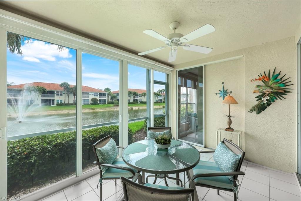 23730 Eddystone Road, Unit 5102 Bonita Springs, FL 34135 - Photo 14 of 24 a view of a dining room with furniture window and outside view