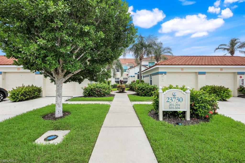 23730 Eddystone Road, Unit 5102 Bonita Springs, FL 34135 - Photo 4 of 24 a front view of a house with garden