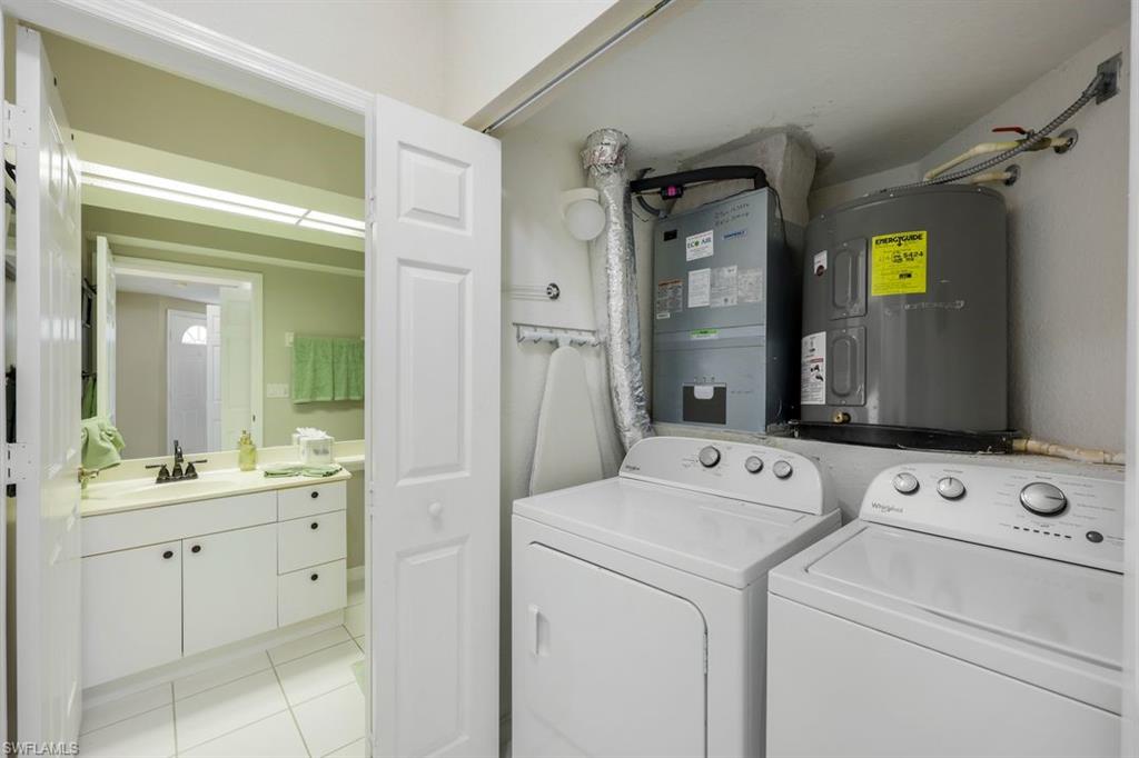 23730 Eddystone Road, Unit 5102 Bonita Springs, FL 34135 - Photo 5 of 24 a view of washer and dryer
