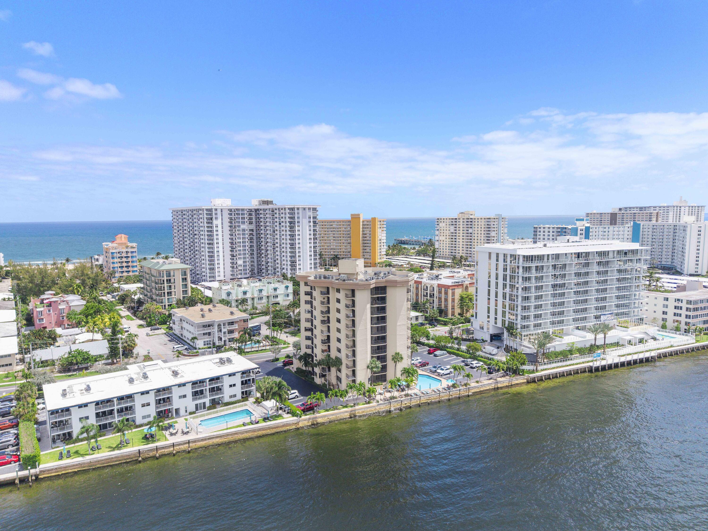 501 North Riverside Drive, Unit 203 Pompano Beach, FL 33062 - Photo 2 of 35 a city view with tall buildings