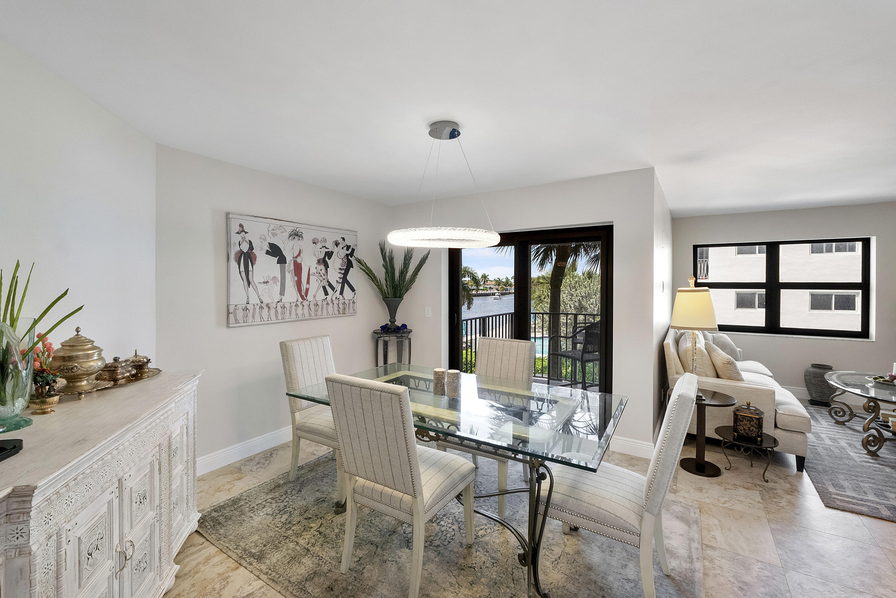 501 North Riverside Drive, Unit 203 Pompano Beach, FL 33062 - Photo 24 of 35 a dining room with furniture and window